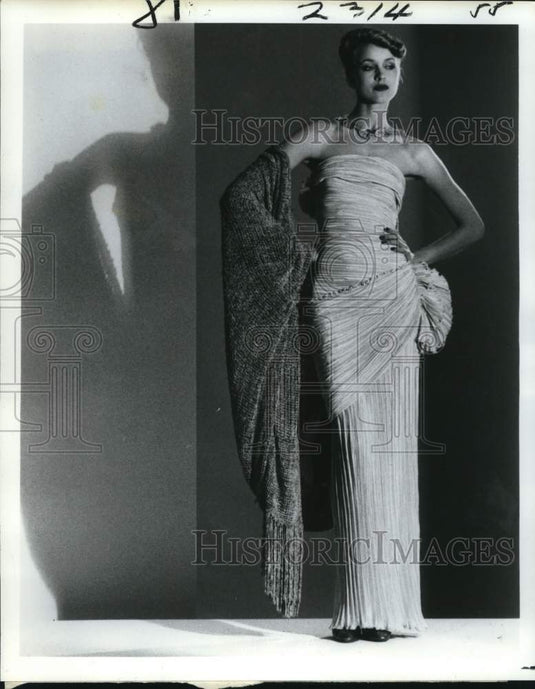 1979 Model wears strapless pleated, body wrap, evening gown-Historic Images
