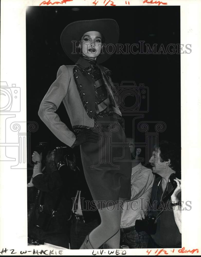 1988 Model in cowboy theme outfit at Mackie Show - Historic Images