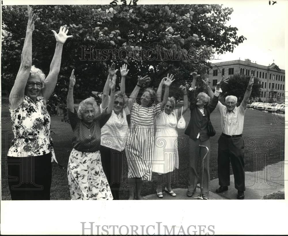 1984 Members of United Way do some exercise along walk path - Historic Images