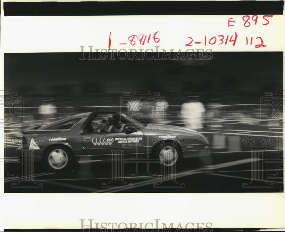 1989 Press Photo University of New Orleans -- Race car speeds by - noc87485- Historic Images