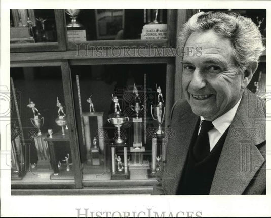 1983 Press Photo Wilfred "Skeeter" Theard poses with the trophies - noc89932 - Historic Images