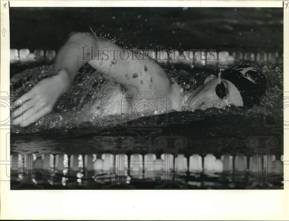 1990 Press Photo David Stutts in action at the City Swim Championships at U.N.O. - Historic Images