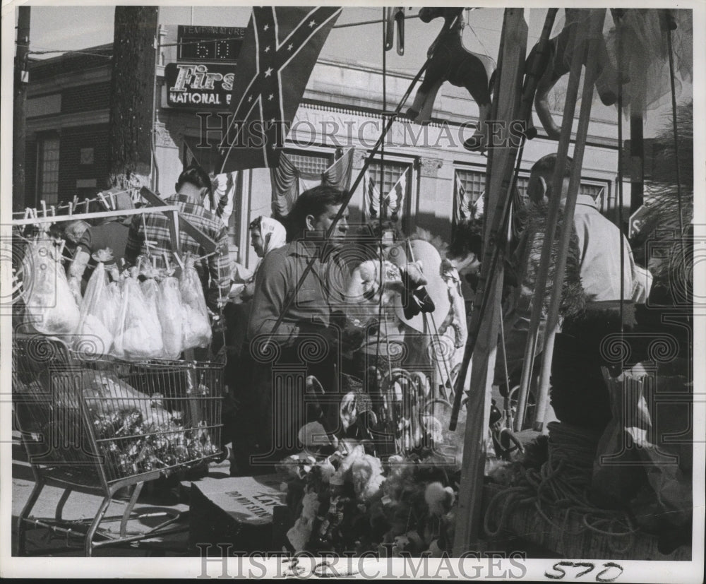 1961 New Orleans Mardi Gras vendor in carnival section  - Historic Images