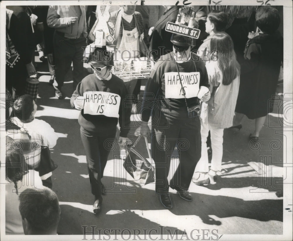 1968 People celebrate Mardi Gras with drinking  - Historic Images