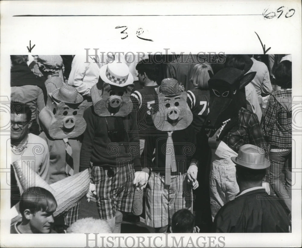 1970 people in pig costumes during Mardi Gras  - Historic Images