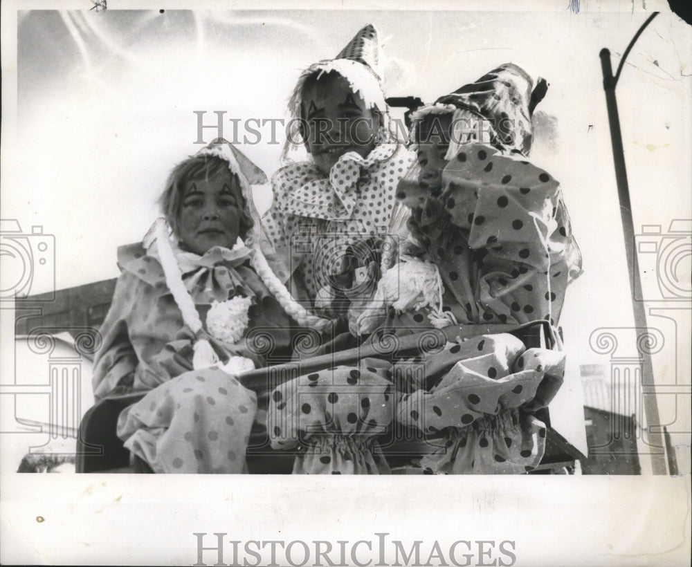 1970 children dressed as clowns enjoy day&#39;s festivities  - Historic Images