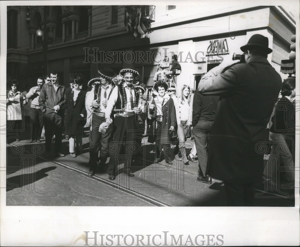 1970 New Orleans Mardi Gras costumes in the street  - Historic Images