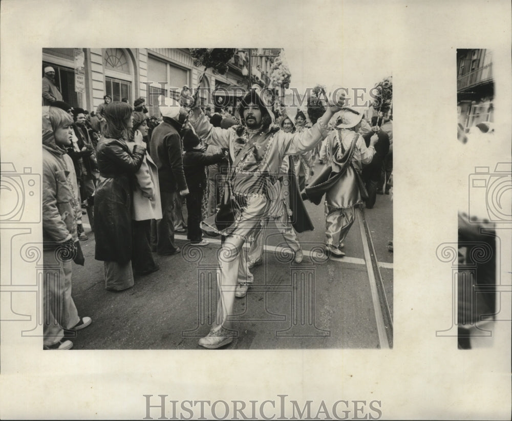 1978 flamboyant man performs during Mardi Gras event.  - Historic Images