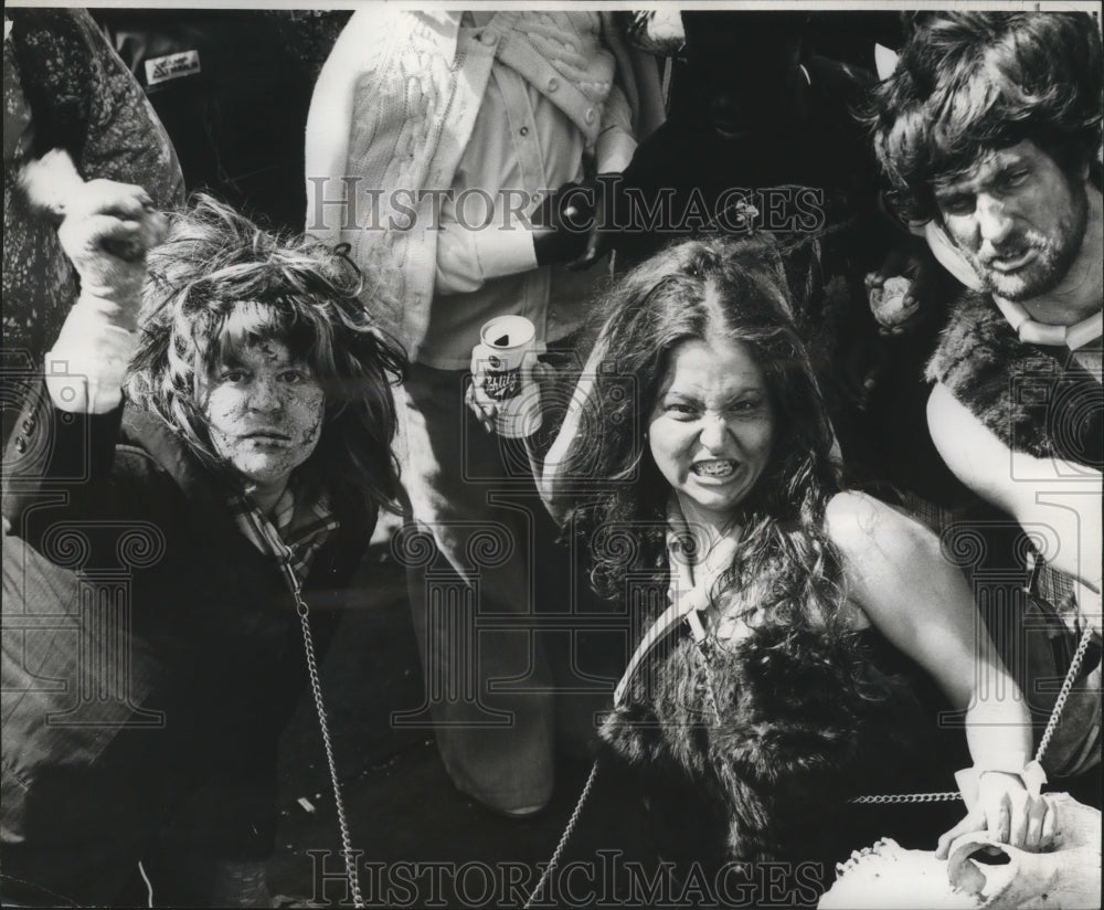 1978 group wears costume chains during Mardi Gras in New Orleans - Historic Images