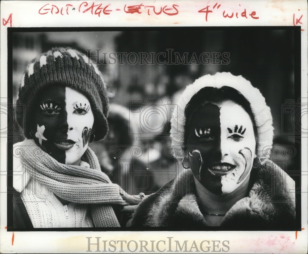 1980 women with painted faces at Mardi Gras in New Orleans, Louisana - Historic Images