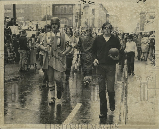 1972 Attendees in Football Attire at the Mardi Gras Parade - Historic Images