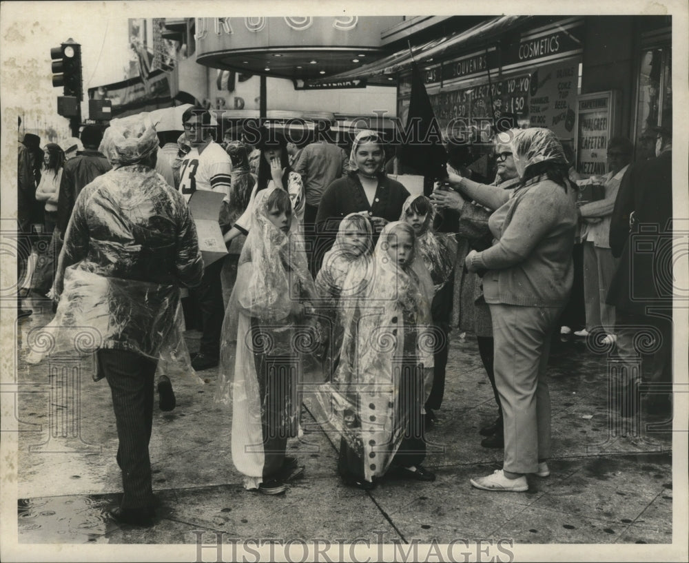 1972 Children in Rain Gear at Mardi Gras  - Historic Images