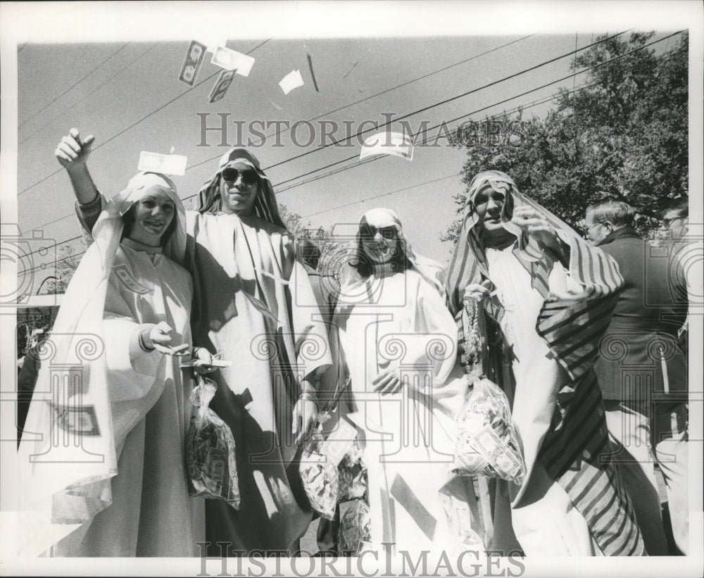 1974 Carnival Maskers Dressed as Arabs Throwing Money in New Orleans - Historic Images