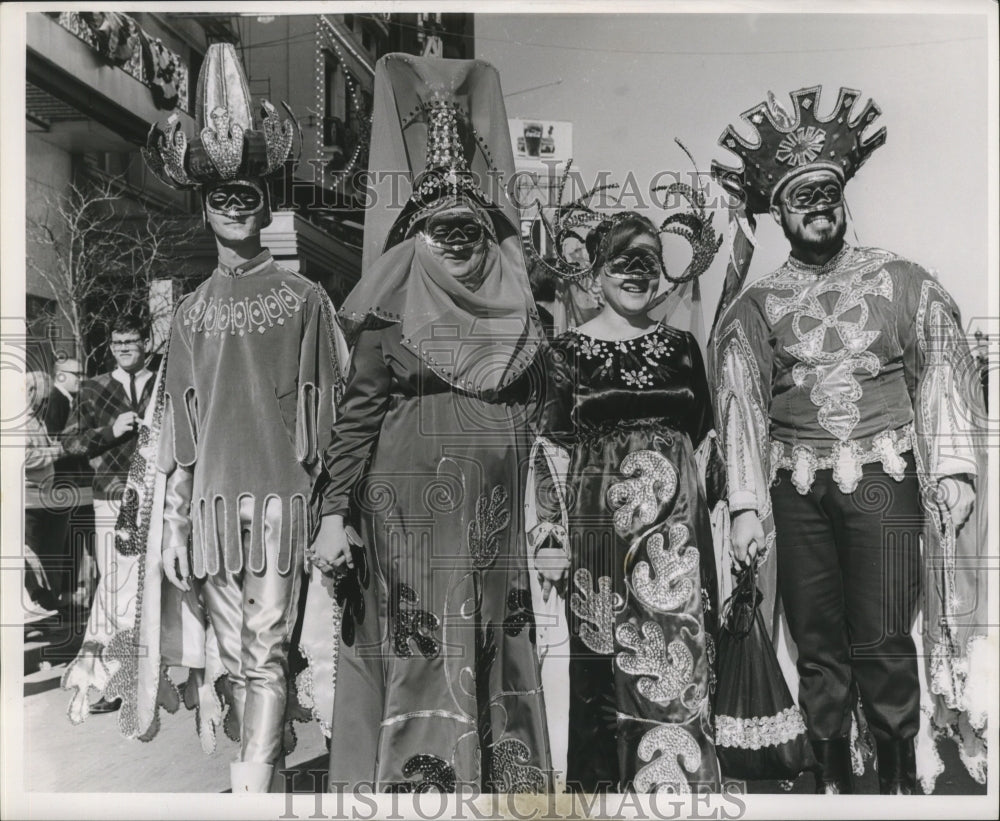 1964 Carnival maskers along the way.  - Historic Images