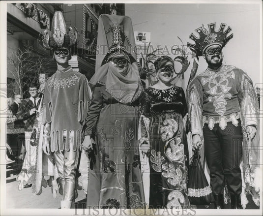 1964 Carnival maskers along the way.  - Historic Images