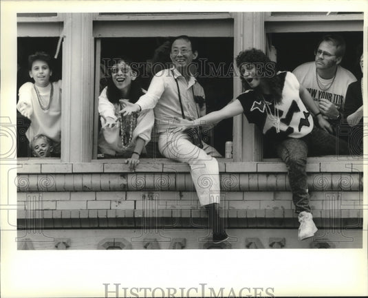1990 Spectators Reach out for Beads During Rex Parade at Mardi Gras - Historic Images