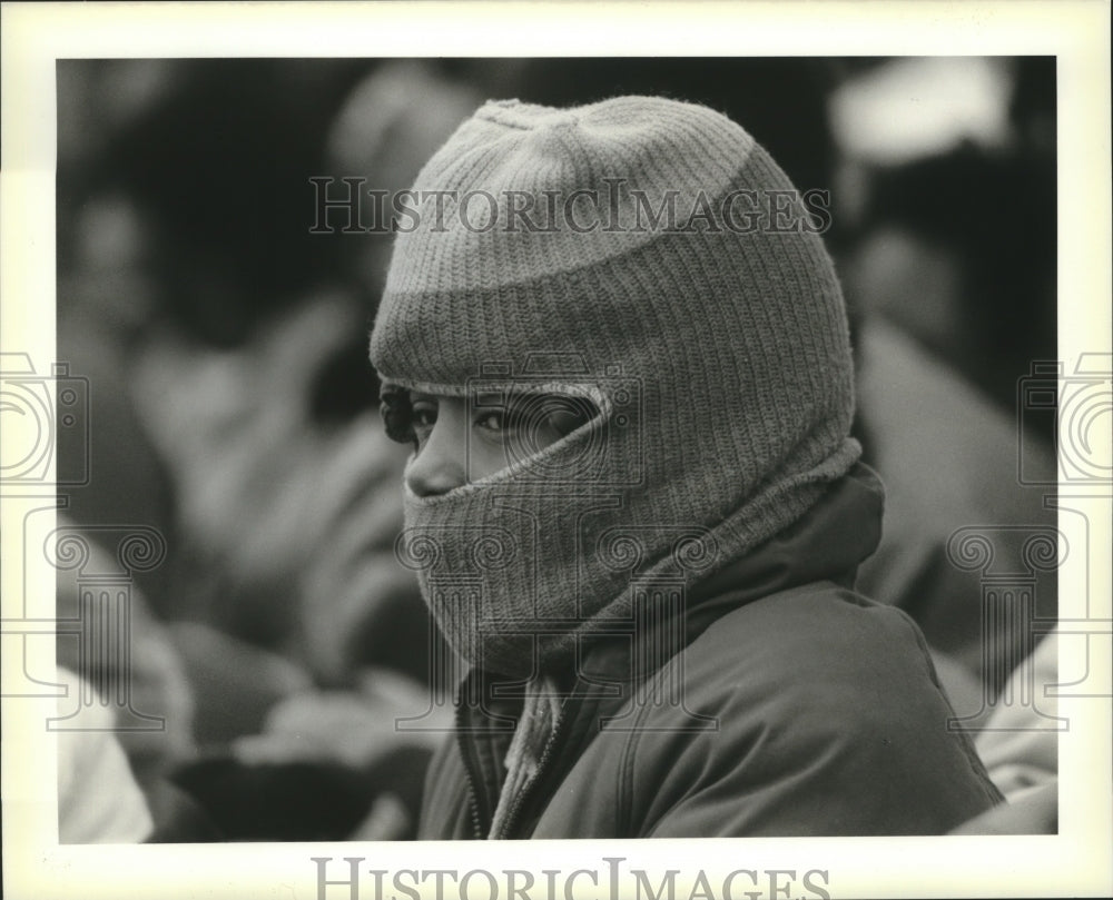 1989 Willie Ingram wears a ski mask to keep warn during Mardi Gras - Historic Images