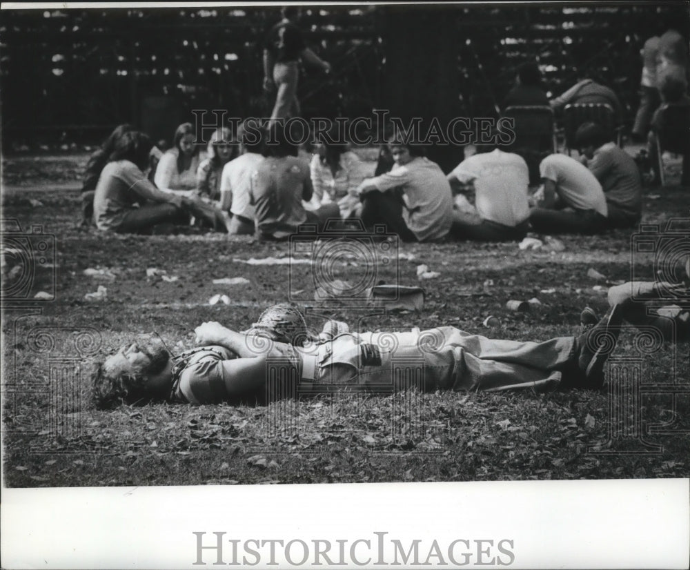 Attendee Taking a Break, Mardi Gras, New Orleans  - Historic Images