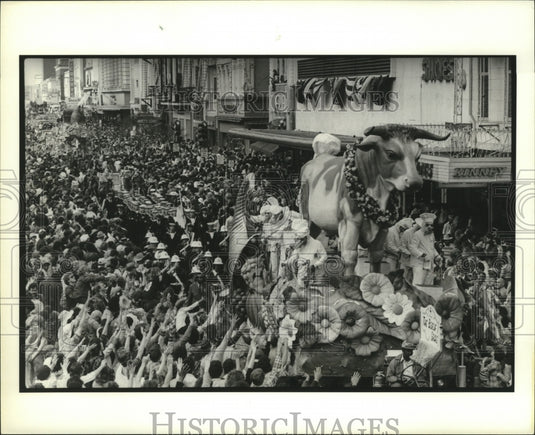 1988 Bull Float in Carnival Parade Watched by Crowd in New Orleans - Historic Images