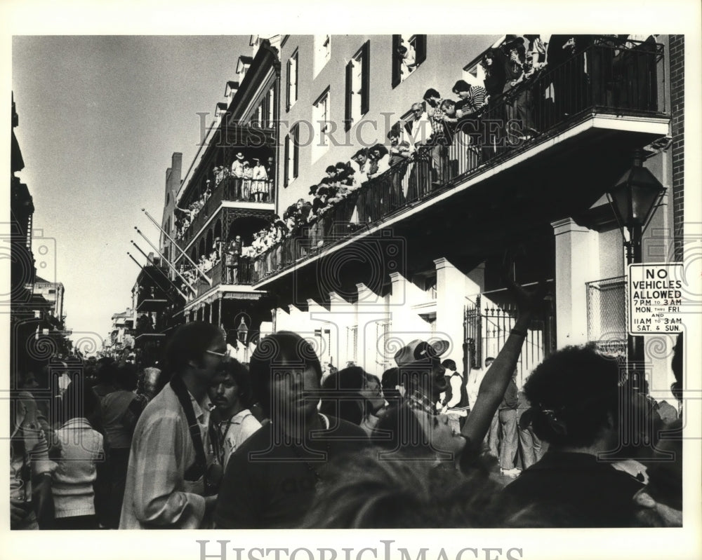 1988 Crowd in Street and Balconies in at Carnival in New Orleans - Historic Images