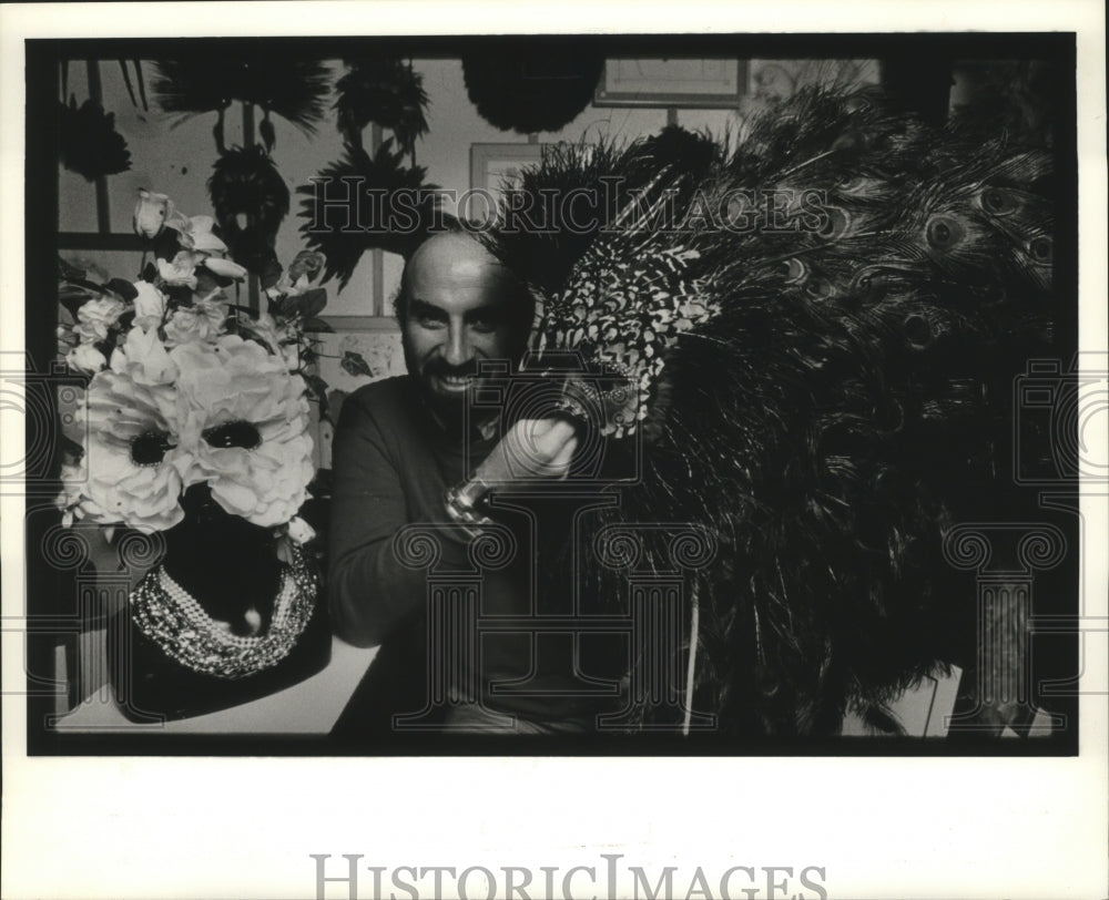 1985 Man Holds Detailed Peacock Mask, Mardi Gras, New Orleans - Historic Images