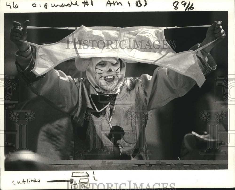 1987 Carnival parade maskers.  - Historic Images