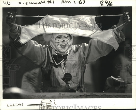 1987 Carnival parade maskers.  - Historic Images