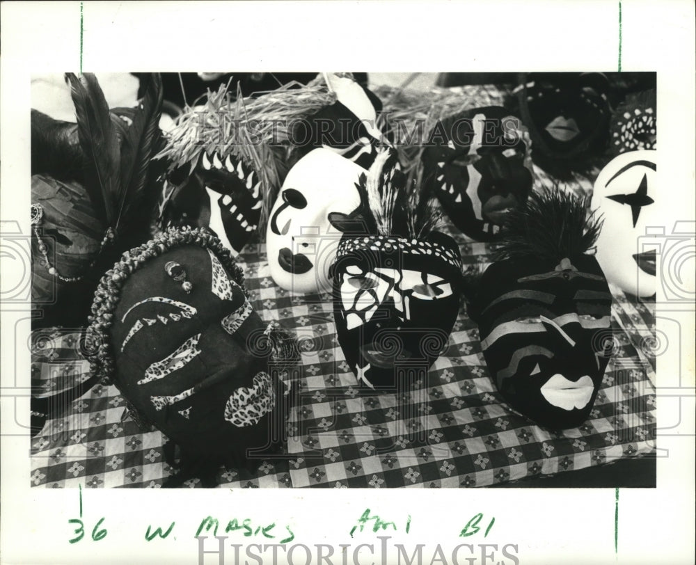 1987 Mardi Gras masks on display at Mask Market.  - Historic Images