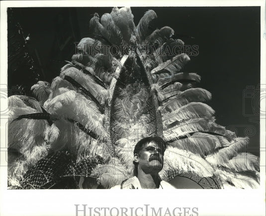 1988 Jason Guidry sports some fine plumage in the French Quarter, - Historic Images