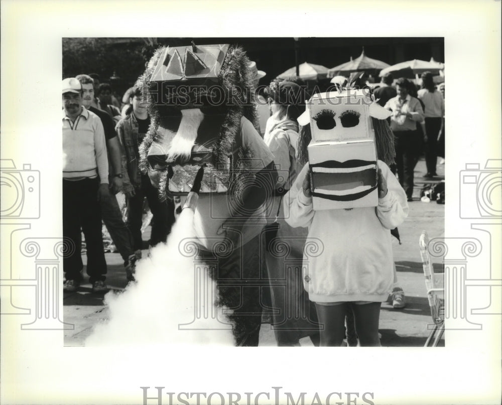 1990 Fire Dragon Monsters blow smoke at Mardi Gras, New Orleans - Historic Images