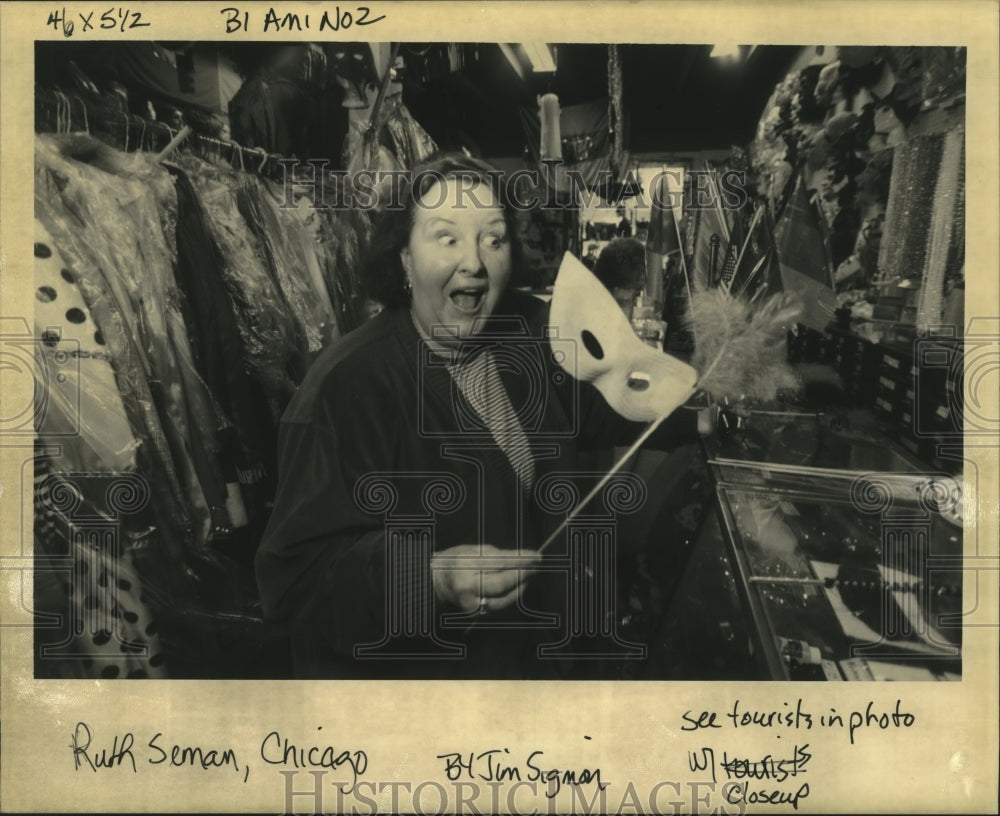 tourist Ruth Seman from Chicago searching for masks  - Historic Images