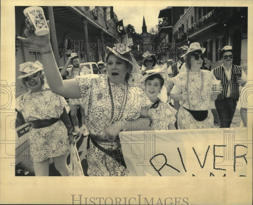 1992 group dressed as riverboat gamblers take part in parade - Historic Images