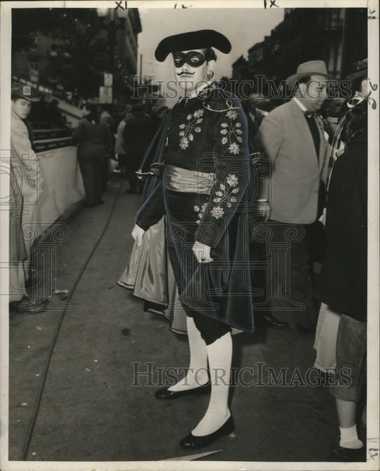 1954 man at Mardi Gras dressed as a Spanish matador  - Historic Images