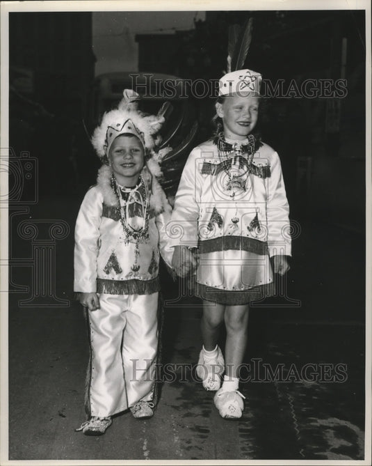 Children wear costumes during Mardi Gras in New Orleans  - Historic Images