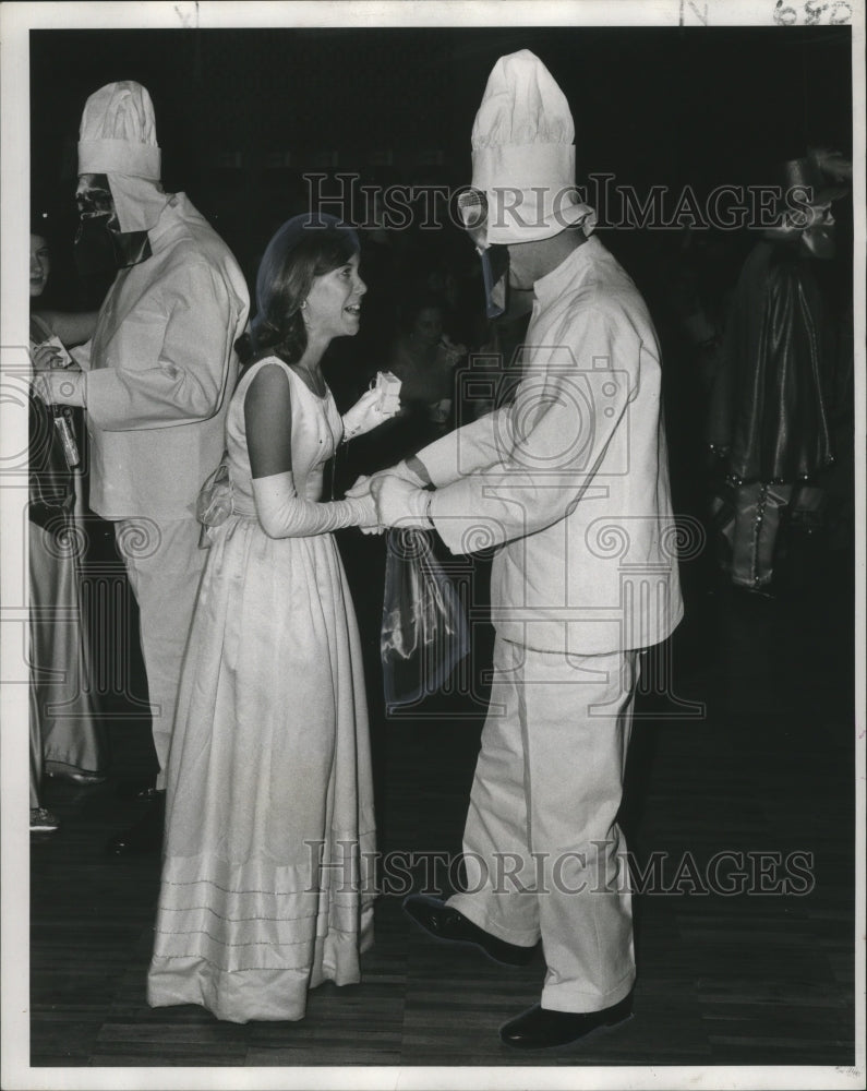 1971 Carnival Revelers Maid Renee Read exclaims &quot;I cant believe it. - Historic Images