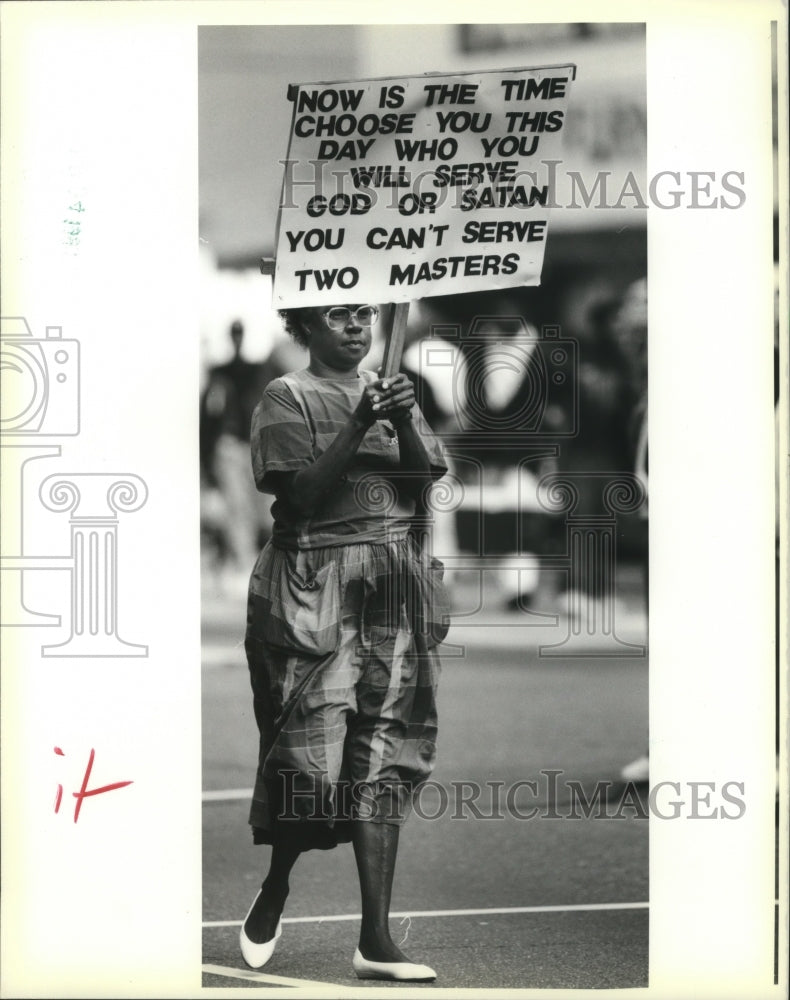 1990 Carnival Spectators show their own agenda.  - Historic Images