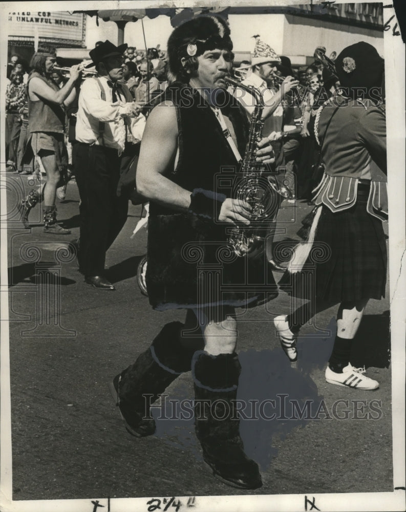 1974 Man Dressed in Fur Playing Saxophone at Carnival in New Orleans - Historic Images