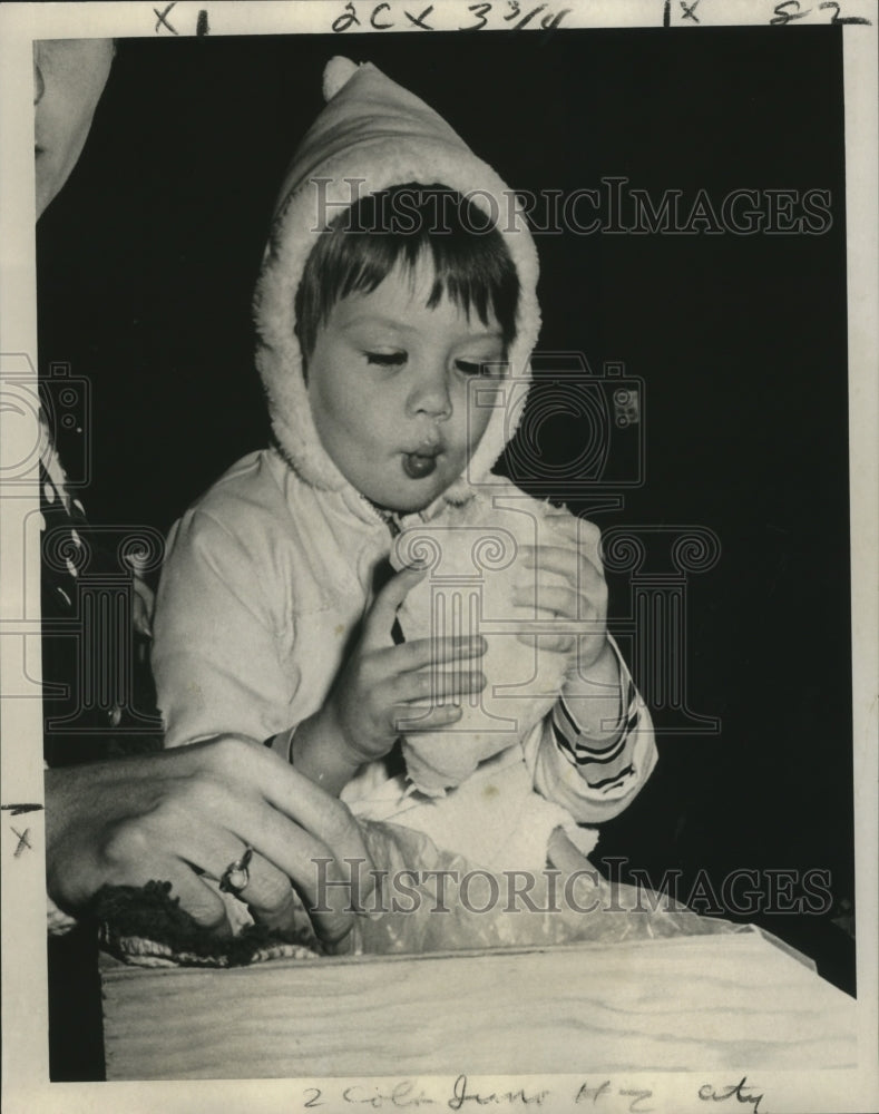 1974 Child Enjoys Cotton Candy at Krewe of Juno New Orleans Parade - Historic Images