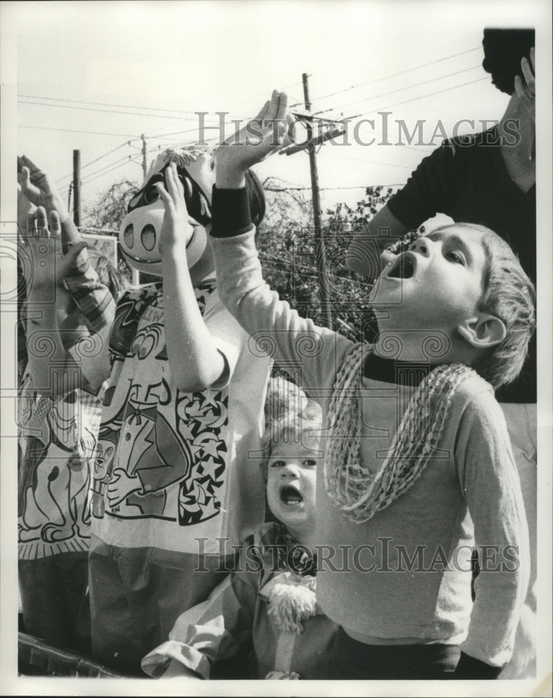 1975 Carnival spectators at Arabi Parade.  - Historic Images