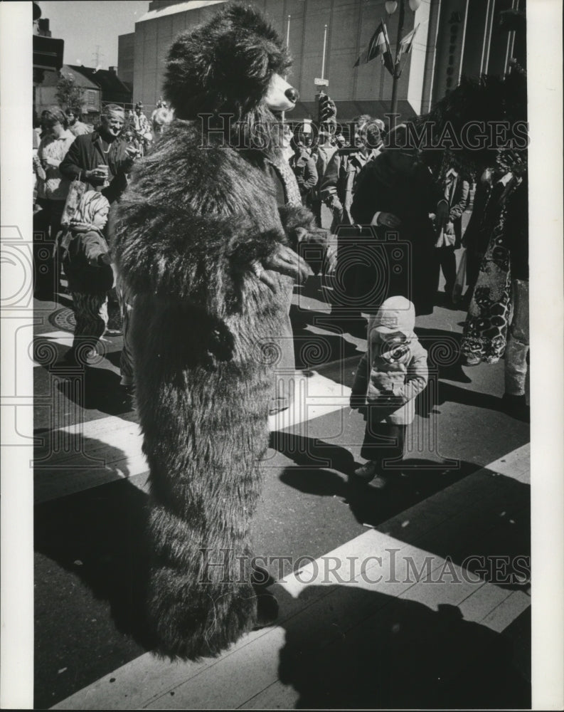 1974 Young Child Looks at Carnival Masker as a Bear in New Orleans - Historic Images