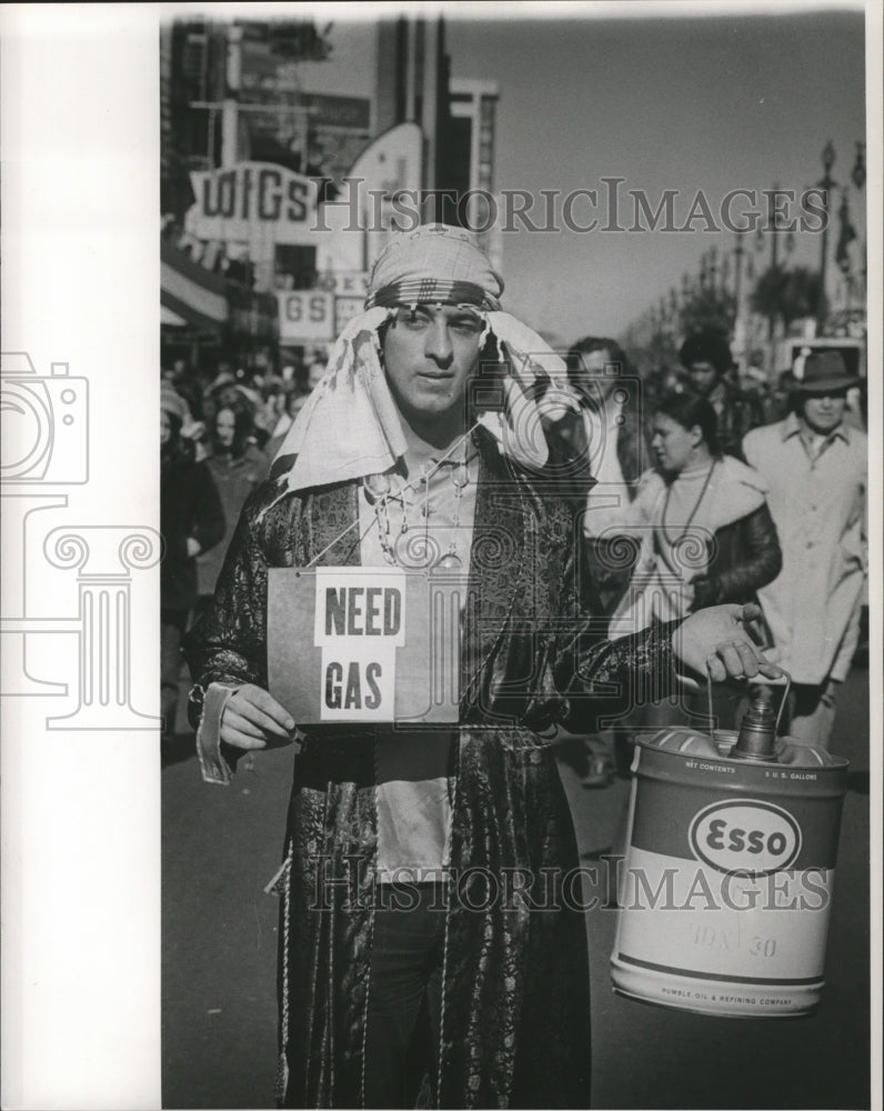 1975 Carnival Masker as Arab with Gas Can in New Orleans  - Historic Images