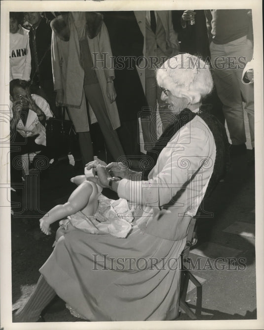 1963 New Orleans Mardi Gras grandmother and baby  - Historic Images
