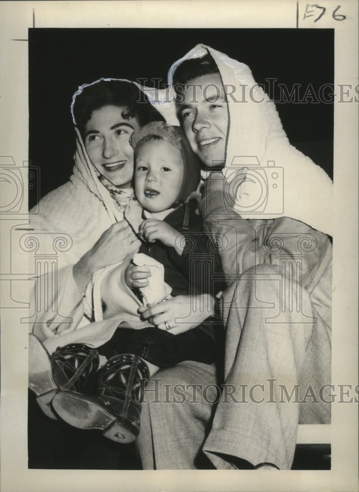 1958 Mr. and Mrs. Garey Gordon and son at Mardi Gras Parade - Historic Images