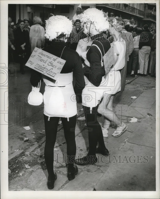 1960 New Orleans Mardi Gras lion and lioness costumes in the street - Historic Images
