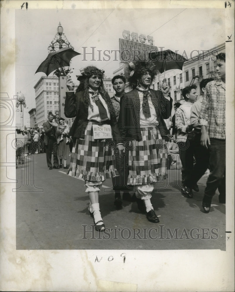 1957 New Orleans Mardi Gras, Paternostros in costume in street - Historic Images