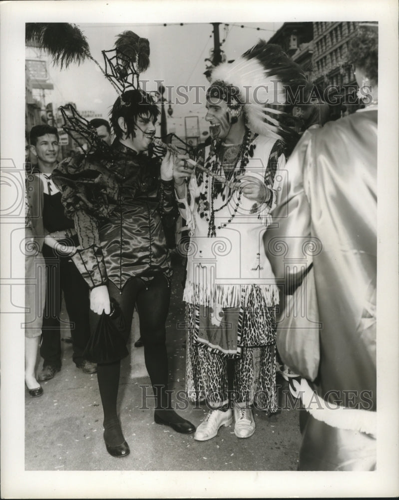 1957 New Orleans Mardi Gras revelers in indian costumes  - Historic Images