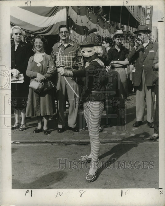 1957 Masked Archer Represents Childhood Stage at Mardi Gras - Historic Images