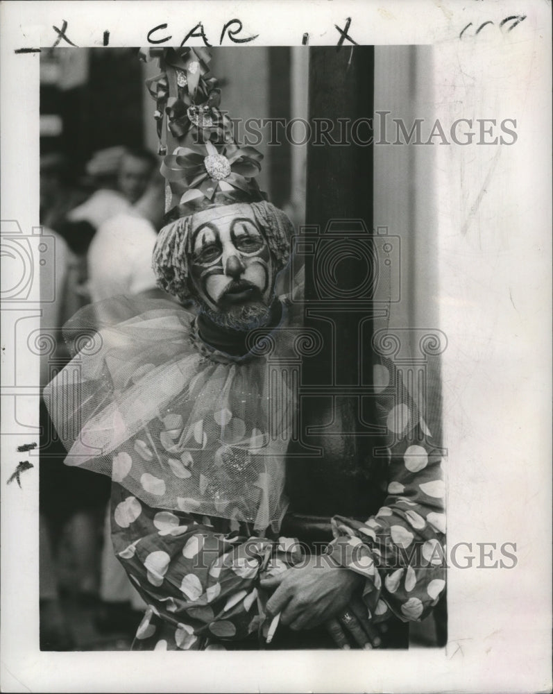 1967 Clown Holds Lamppost on Bourbon Street Mardi Gras New Orleans - Historic Images