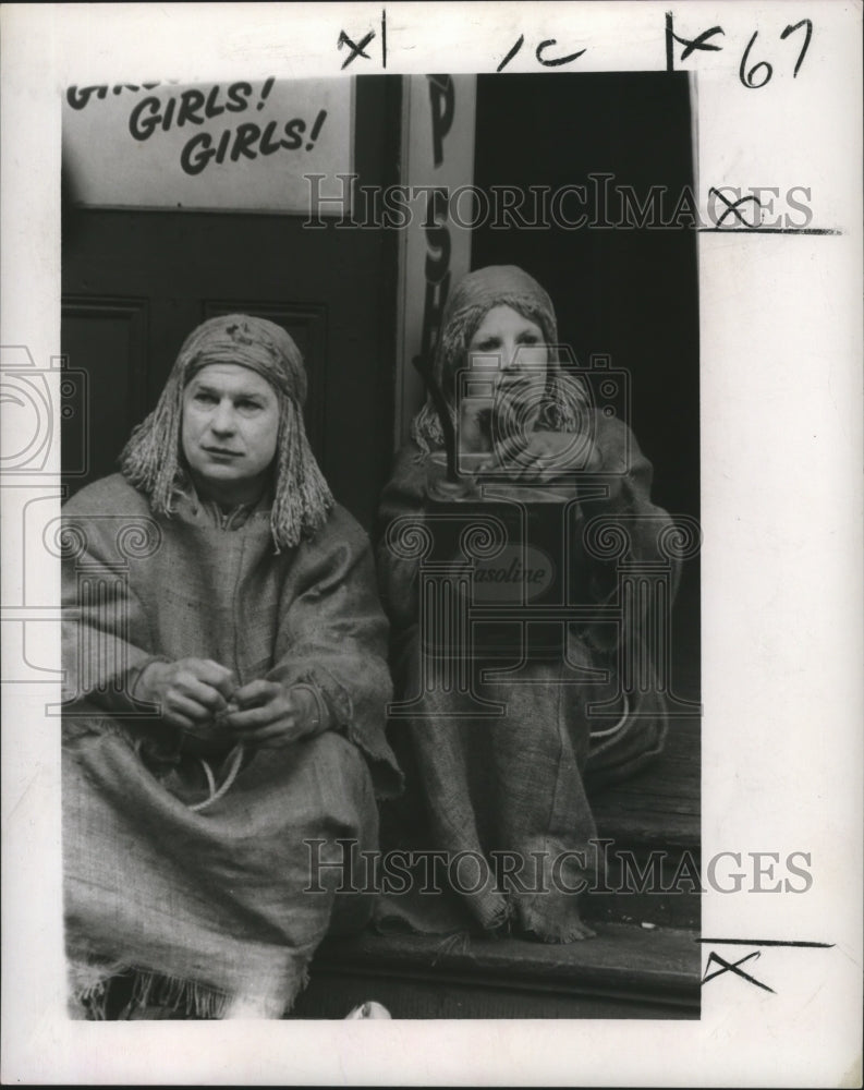 1967 Mardi Gras, New Orleans Carnival maskers take a break. - Historic Images