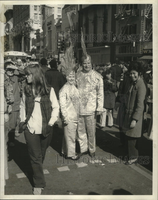 1971 Carnival Maskers stand out in crowd  - Historic Images